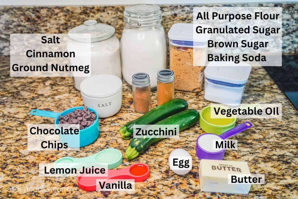 Ingredients for zucchini muffins laid out on a counter.