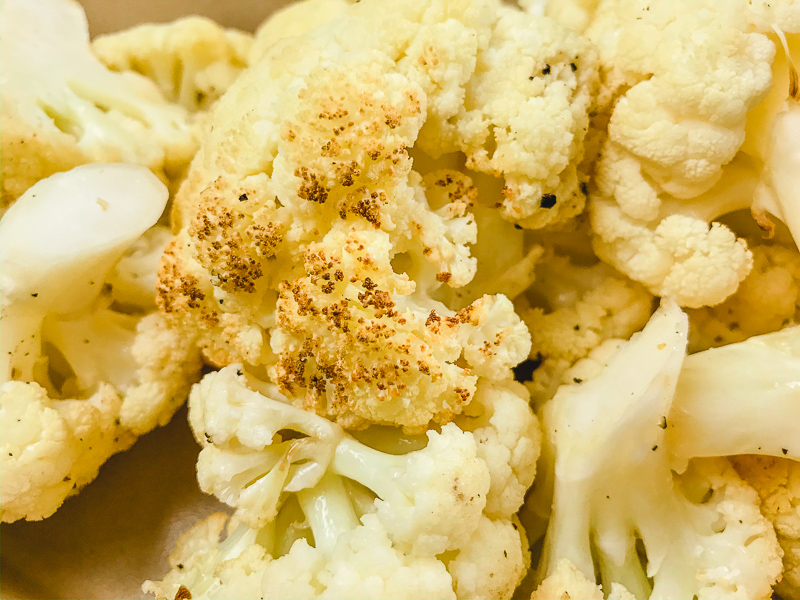 Close up of air friend cauliflower showing it slightly browned.