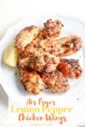 A plate of chicken wings with words "air fryer lemon pepper chicken wings"
