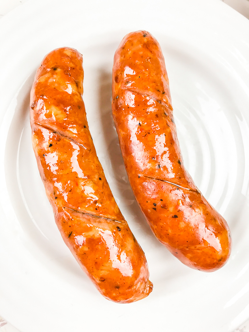 Close up of air fryer sausages.