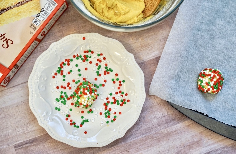Cake mix cookies rolled into christmas sprinkles.