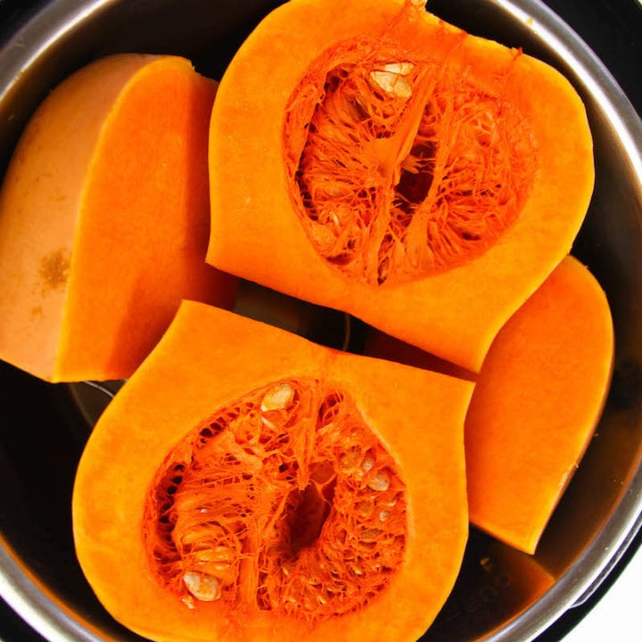 Instant pot with butternut squash inside.