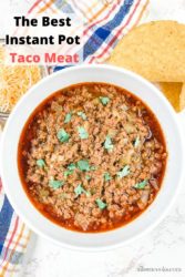 A picture of taco meat in a white bowl and the words "the best instant pot taco meat".