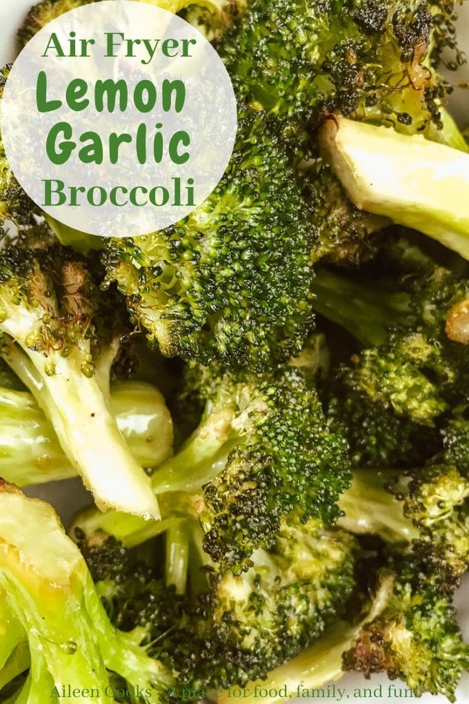 Close up of broccoli with words "air fryer lemon garlic broccoli" in green letters.