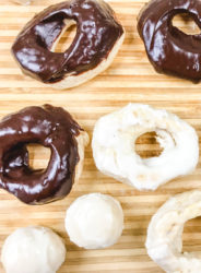 Close up of vanilla and chocolate donuts.