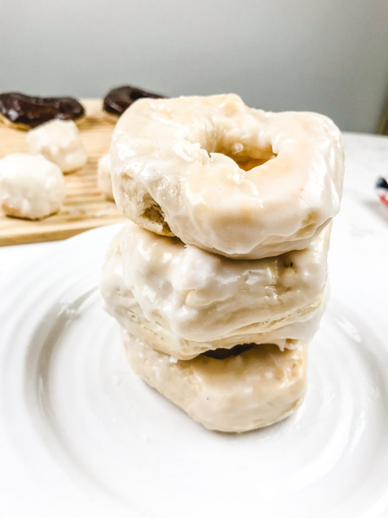 A stack of three glazed air fryer donuts.