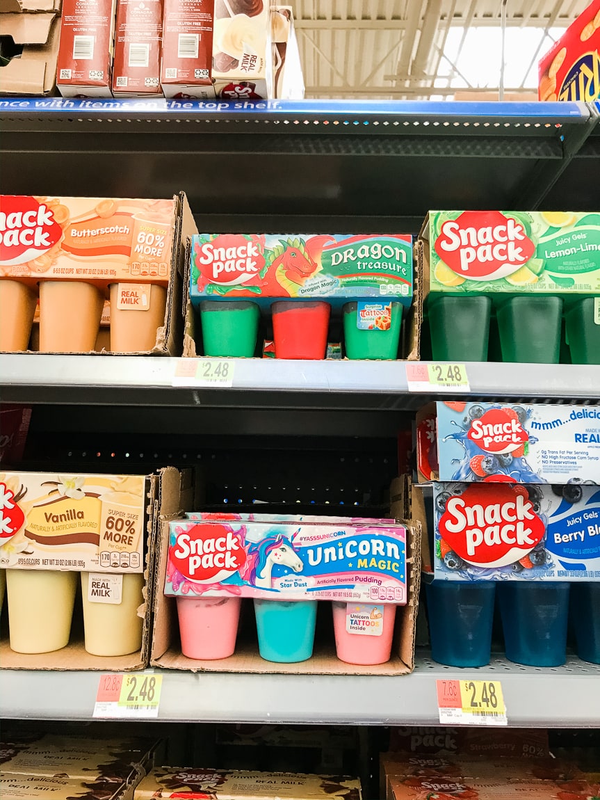 Store aisle with various snack pack varieites.