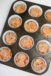 Muffin tin filled with batter.