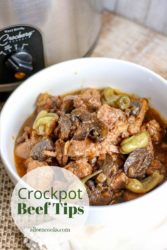 Picture of crockpot beef tips with circle and words "crockpot beef tips aileencooks.com"
