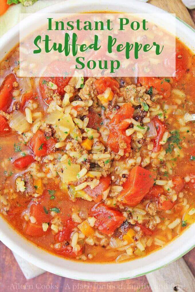 Close up of stuffed pepper soup in white bowl with words "Instant pot stuffed pepper soup" in green letters.