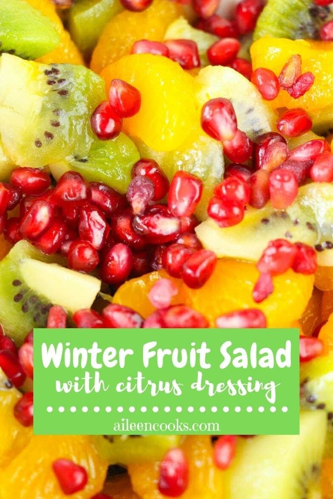 Close up of fruit salad with words "winter fruit salad with citrus dressing"