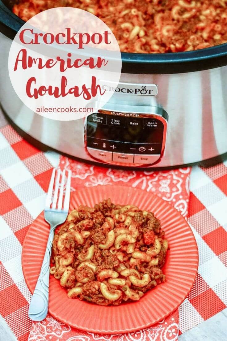 A picture of goulash in a crockpot with the words "crockpot American goulash" in red letters in the top left hand corner.