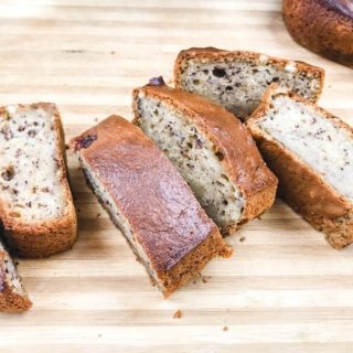 Slices of banana bread on wooden cutting board