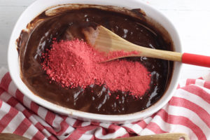 Melted chocolate with strawberry dust on top.