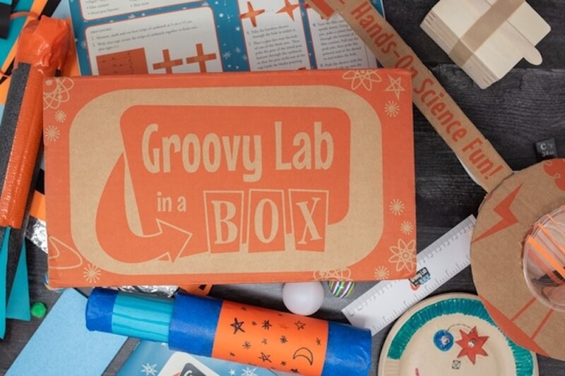 Groovy Lab Box with STEAM crafts around it.