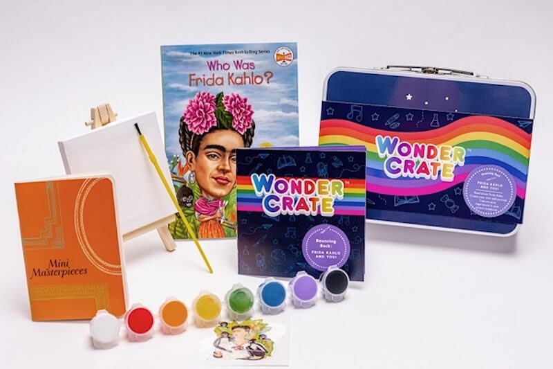 Wonder crate box with paint and book.