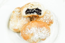 Close up for air fried Oreos dusted with powdered sugar.