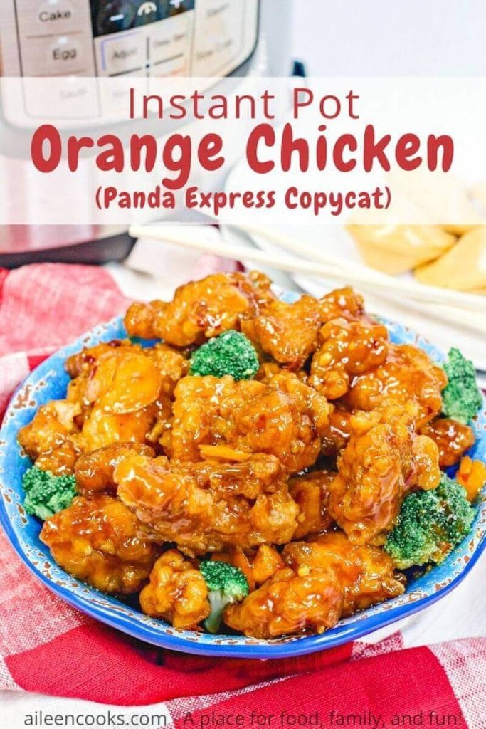 A photo of orange chicken in a blue bowl with words "instant pot orange chicken Panda Express copycat".