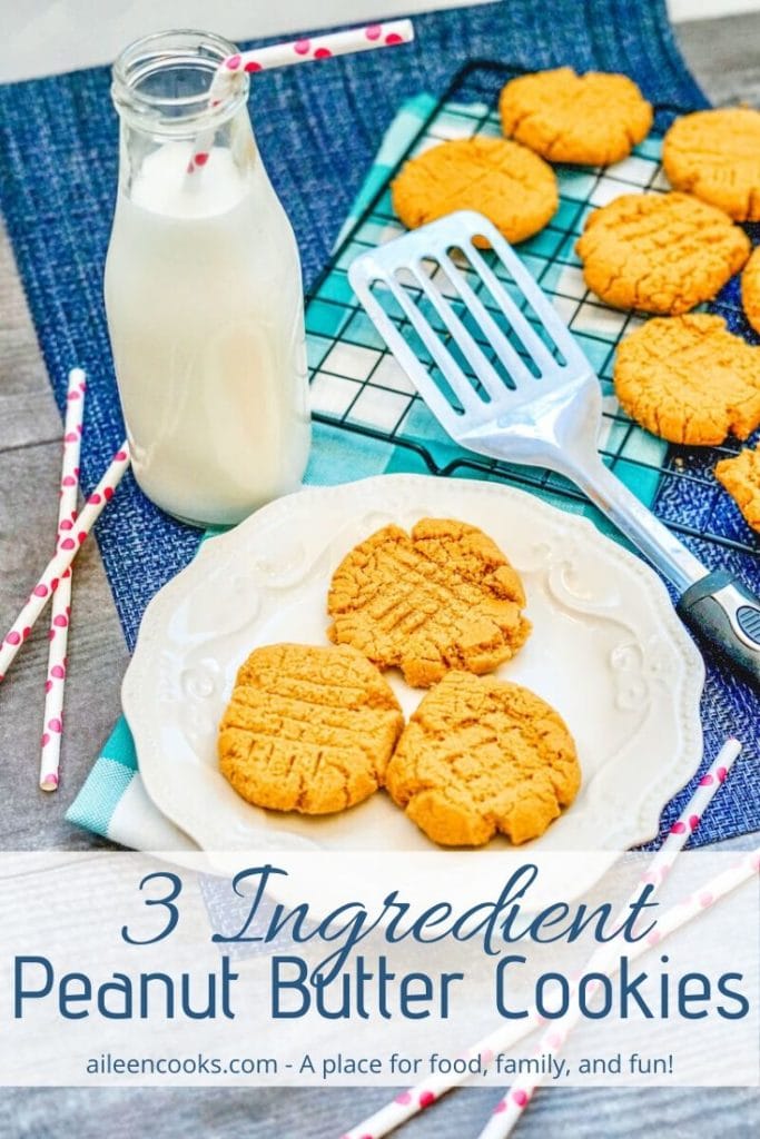 A white plate of peanut butter cookies with the words "three ingredient peanut butter cookies" in blue letters.
