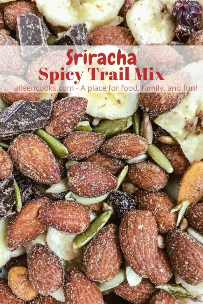 Close up of spicy trail mix with the words "Sriracha spicy trail mix" in red lettering.