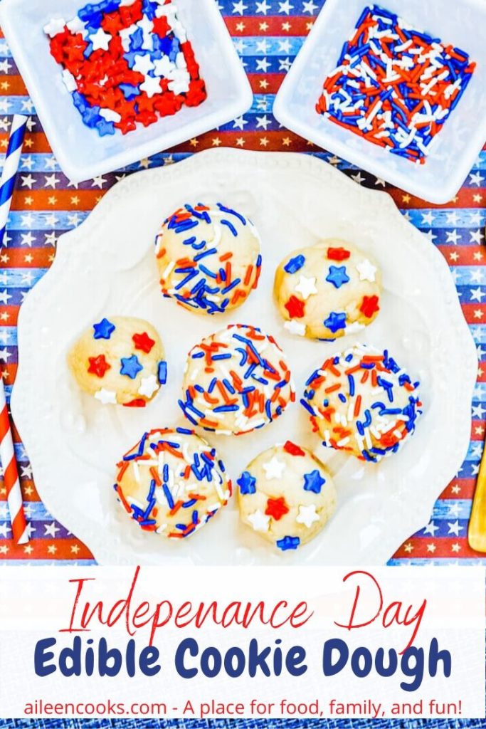 White plate of cookie dough balls topped with sprinkles and the words "independence day edible cookie dough" in red and blue lettering.