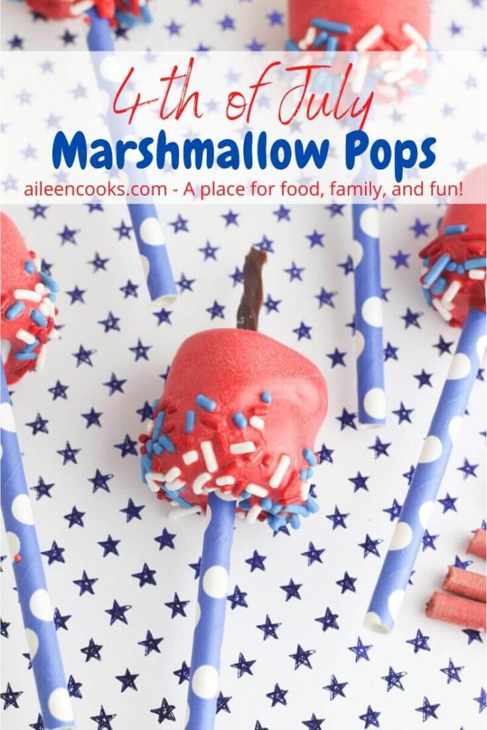 A close up of a marshmallow pop with the words "4th of July marshmallow pops" in red and blue lettering.