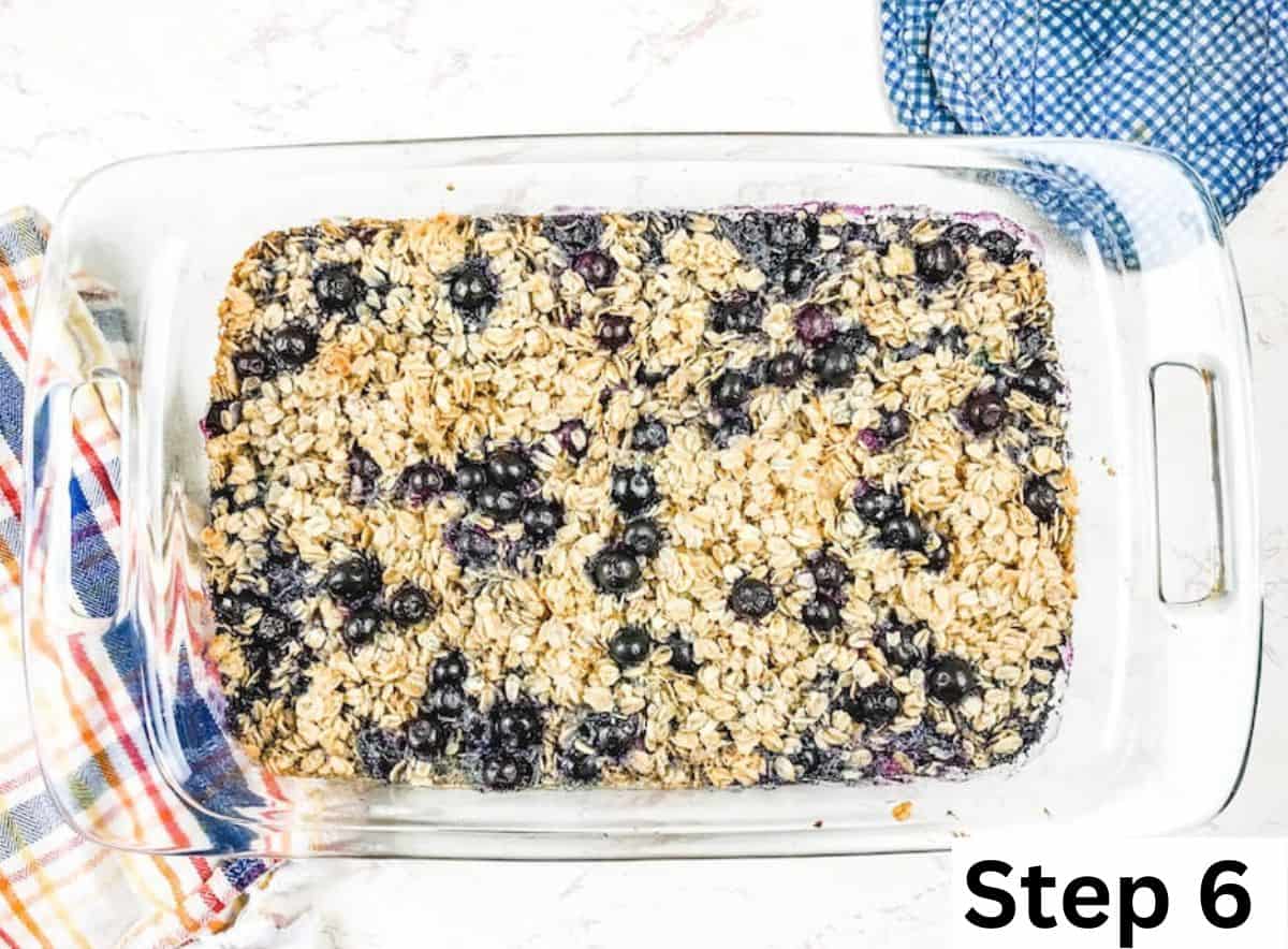 A glass baking dish filled with baked oatmeal, next to an oven mitt.