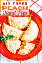 A red plate of hand pies with the words "air fryer peach hand pies" in orange lettering.