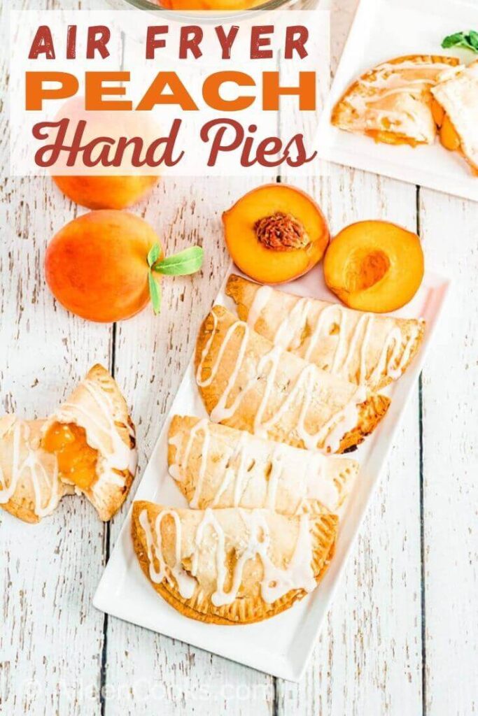Overhead shot of a hand pies on a white platter with the words "air fryer peach hand pies" in red lettering.