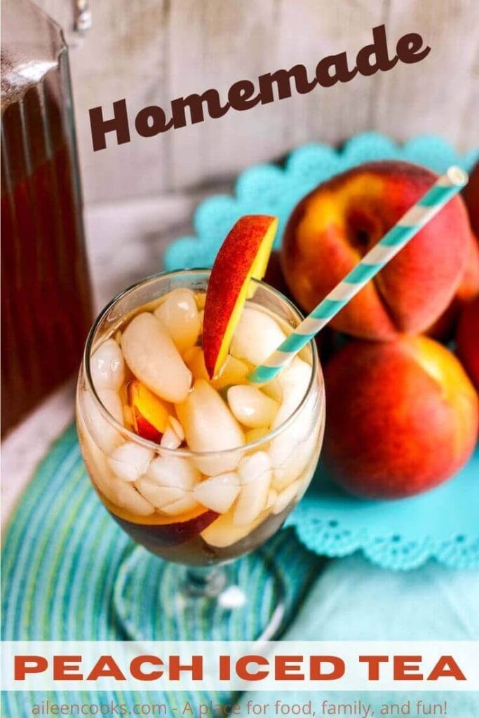 Overhead shot of a glass of iced tea with a slice of peach on the rim of the glass and the words "homemade peach iced tea".