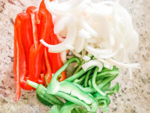 Sliced bell peppers and onions.
