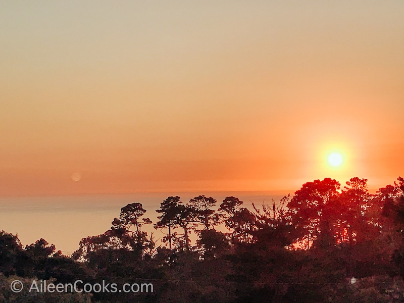 The sun setting over the ocean in Carmel by the Sea.