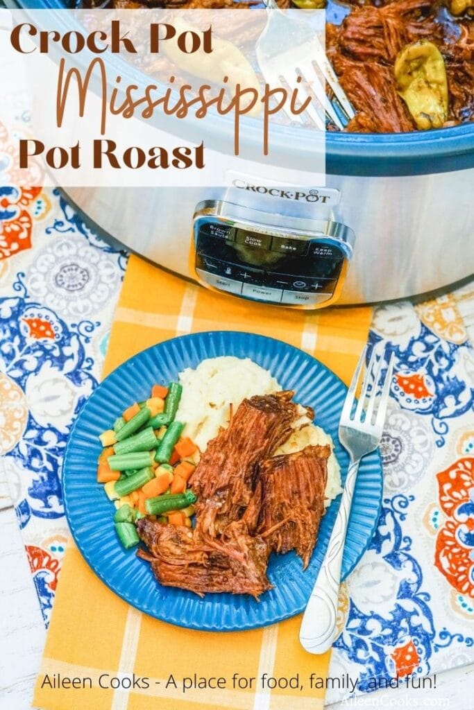 A crockpot full of pot roast next to a plate of pot roast with the words "Crock Pot Mississippi Pot Roast" in brown lettering.