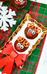 Reindeer cupcakes with red jelly bean noses.