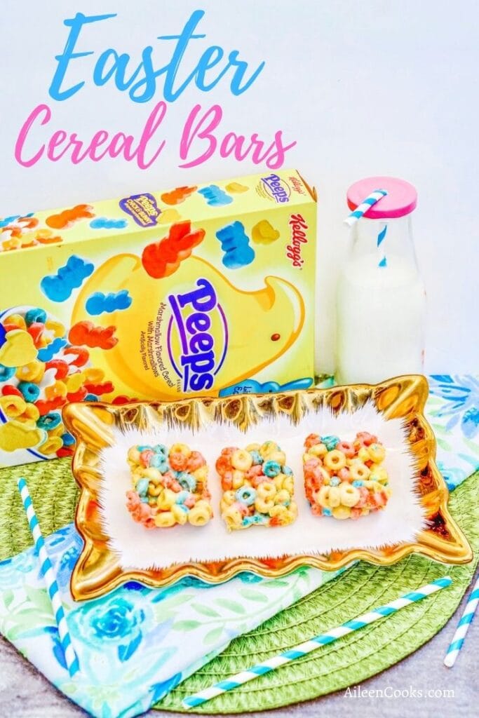 A box of peeps cereal behind tray of three easter cereal bars.