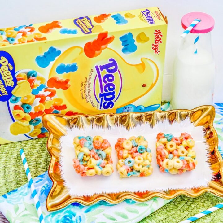 A gold platter with three colorful cereal bars.