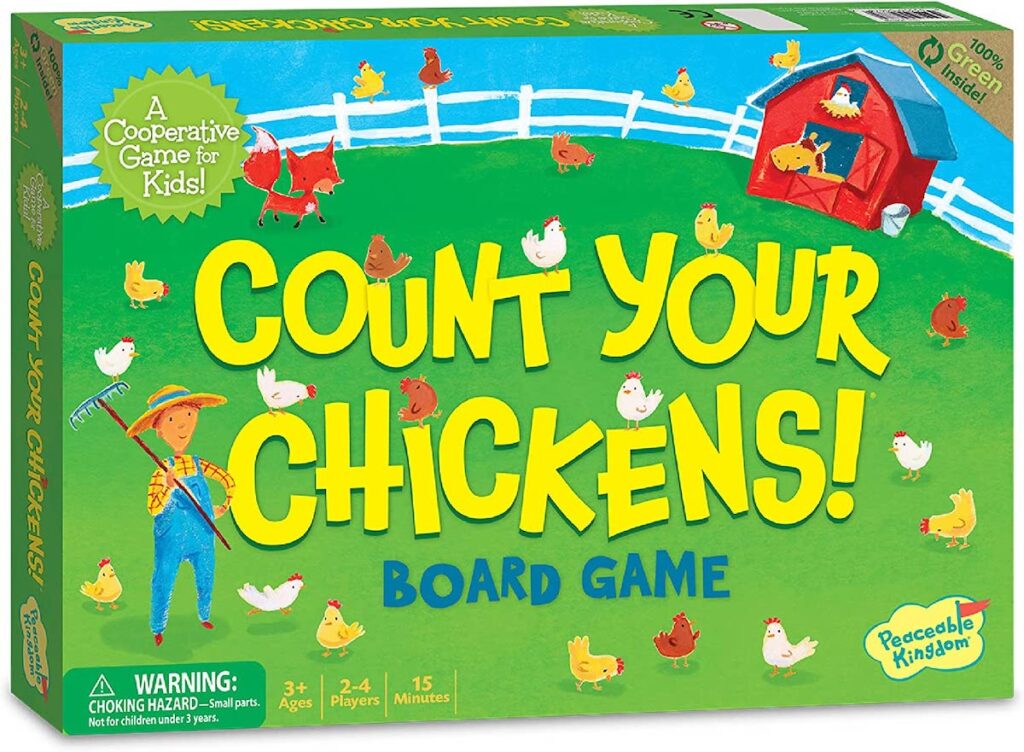 A green board game cover with a picture of a farm and the words "count your chickens".
