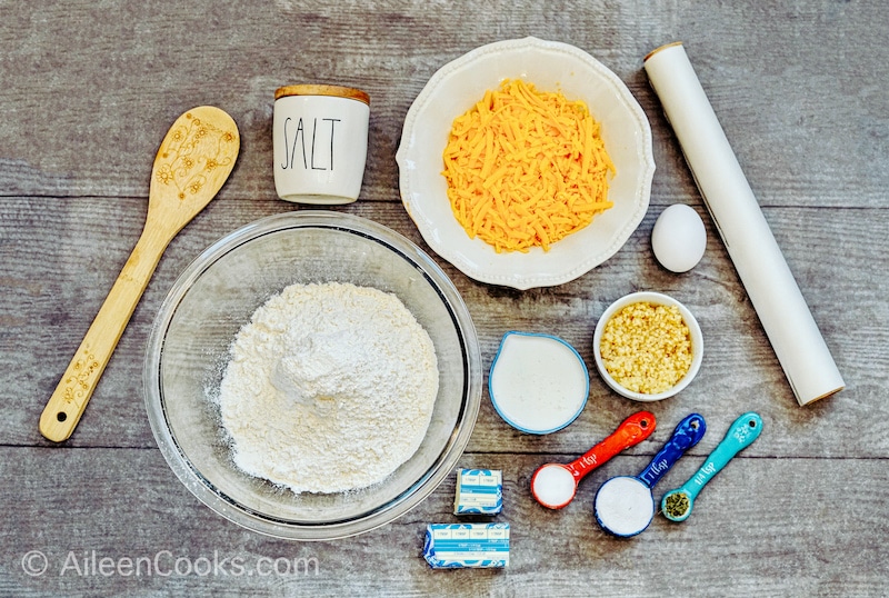 Bird’s eye view of ingredients to make Copycat Red Lobster Biscuits, sitting on a wooden table